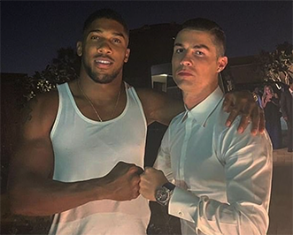 Anthony Joshua Poses With Cristiano Ronaldo Ahead Of Friday’s Boxing Bout With Ngannou -